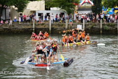 Kingsbridge - Kingsbridge Fair Week - Raft Race - "Rafty McRaftface" head off The "Faux Fur Vikings" and "HMS Quayside" at the turn